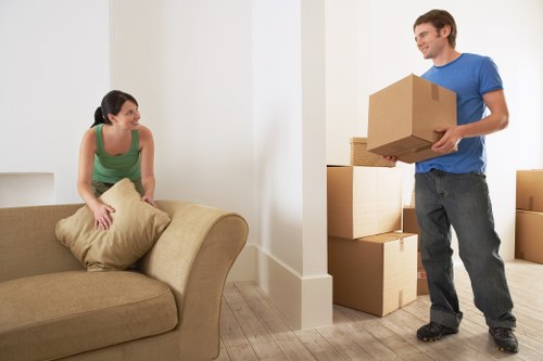 Packed moving boxes and labeled items ready for transport
